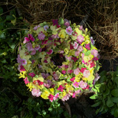 Jens Jakobson Wedding: wreath of joy, cherry blossom, yellow pansies, orchids